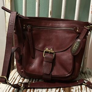 Born brand large crossbody bag in Merlot. Looks new - but isnt.